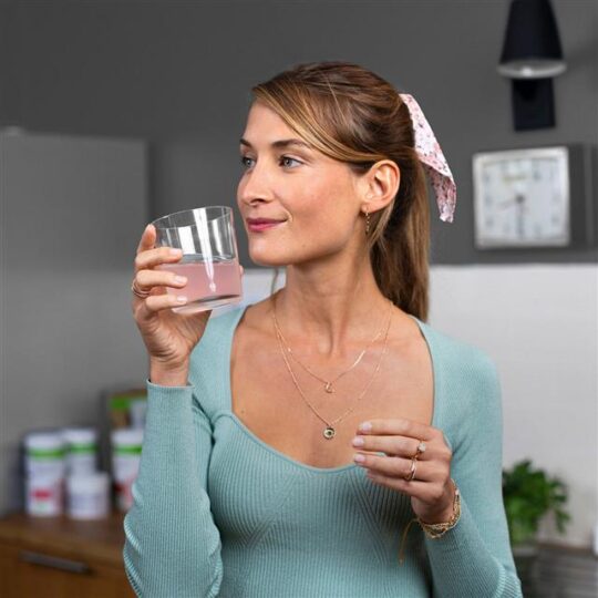 Woman Drinking Collagen Drink